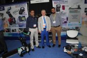 Single rail ultrasonic flaw detector UDS2-77, ad posters of other equipment exhibited at OKOndt Group's booth at the ASNT-2018, USA, Houston (TX)