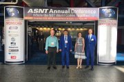 OKOndt Group team at the entrance to the ASNT Annual Conference, Houston, USA, October 2018