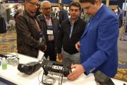 OKOndt GROUP's expert is showing the ASNT-19 attendees the functionalities of portable ultrasonic flaw detector Sonocon BL