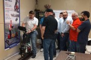 OKOndt Group's expert demonstrates operation of the ultrasonic trolley UDS2-77 on a rail sample at the American customer office, March 2019