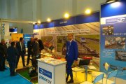 OKOndt Group's specialist meets the visitors of the company's booth at the Third International Exhibition Eurasia Rail-2019, Izmir, Turkey