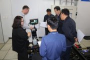 South Korean NDT specialists examine the structure and functions of ultrasonic single rail flaw detector UDS2-77 — training held by OKOndt Group's expert, autumn 2018