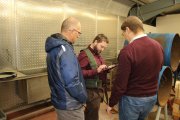 The customer's specialists examine the results of testing of the pipe welded joint sample with the TOFD-Man Wireless System – on-site training, Swansea, UK, December 2017