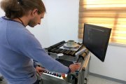 Engineer of OKOndt Group sets up the automated aircraft wheels testing system SmartScan at the customer's office, South Korea, 2019