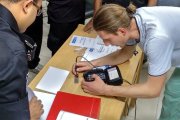 OKOndt Group's engineer shows how to perform calibration of the eddy current flaw detector Eddycon C on the calibration block — the training provided for the company from Bangladesh, 2019