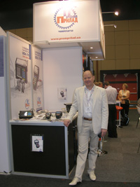 Gennadii Lutsenko represents a booth of OKOndt Group at the 18th World Conference on Non-Destructive Testing WCNDT-2012