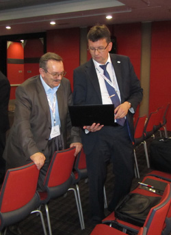 V. Radko, representative of OKOndt Group, with a colleague before seminar on qualification, certification and accreditation of NDT specialists – WCNDT-2012, Durban, South Africa