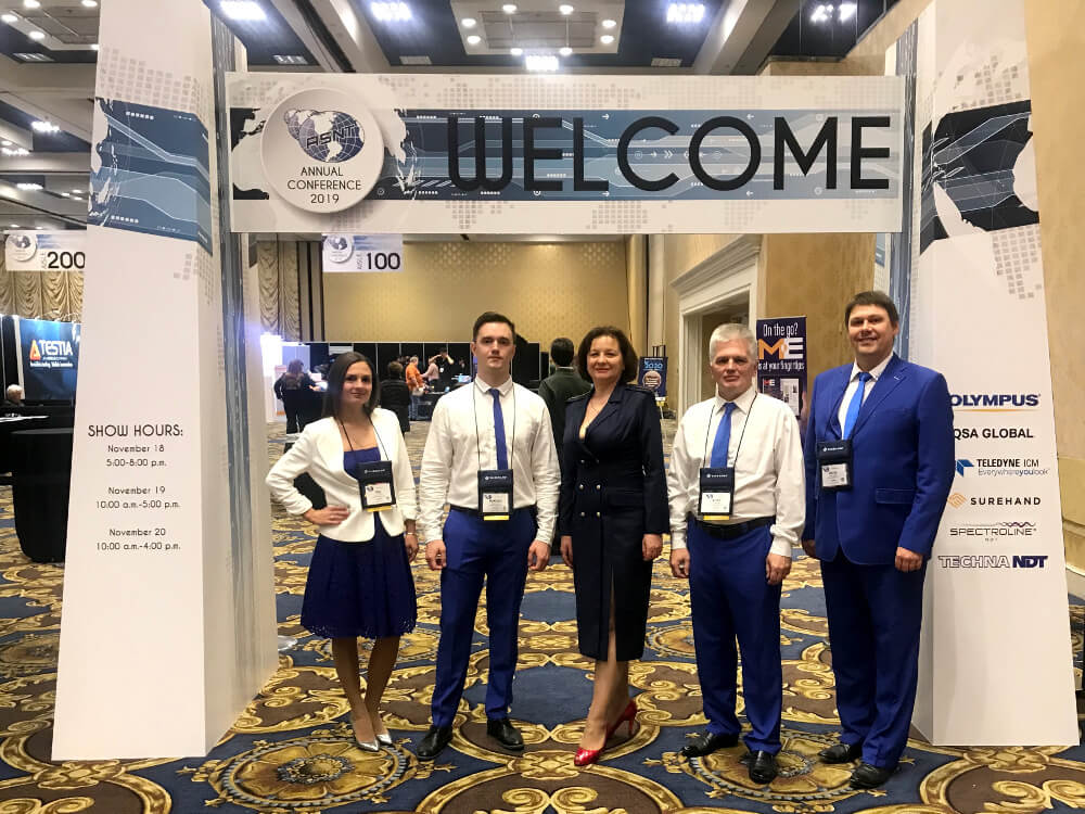 Delegates of OKOndt Group at the entrance of the Annual Conference and Exhibition organized by American Society For Nondestructive Testing, Las Vegas, November 2019