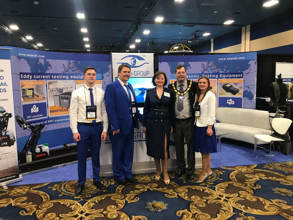 Acting ASNT President Mr. Scott P. Cargill and OKOndt Group representatives near the company’s booth – ASNT-2019, Las Vegas, November 2019