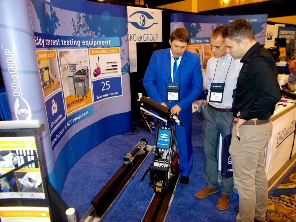 OKOndt Group's expert is demonstrating flaw detection using ultrasonic flaw detector UDS2-77 on a rail sample to the ASNT Annual Conference attendees - Las Vegas, November 2019