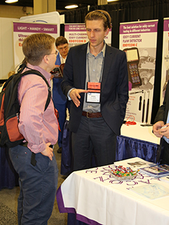 OKOndt Group's representative is communicating with the visitor of the Conference and Exhibition organized by the American Society for Nondestructive Testing 2017