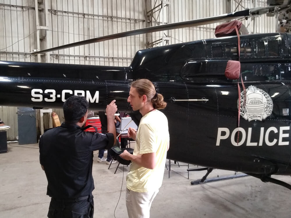 OKOndt Group's specialist holds a training for the Bangladeshi customer's staff on how to detect defects of the helicopter skin using the portable eddy current flaw detector Eddycon C – on-site training, May 2019