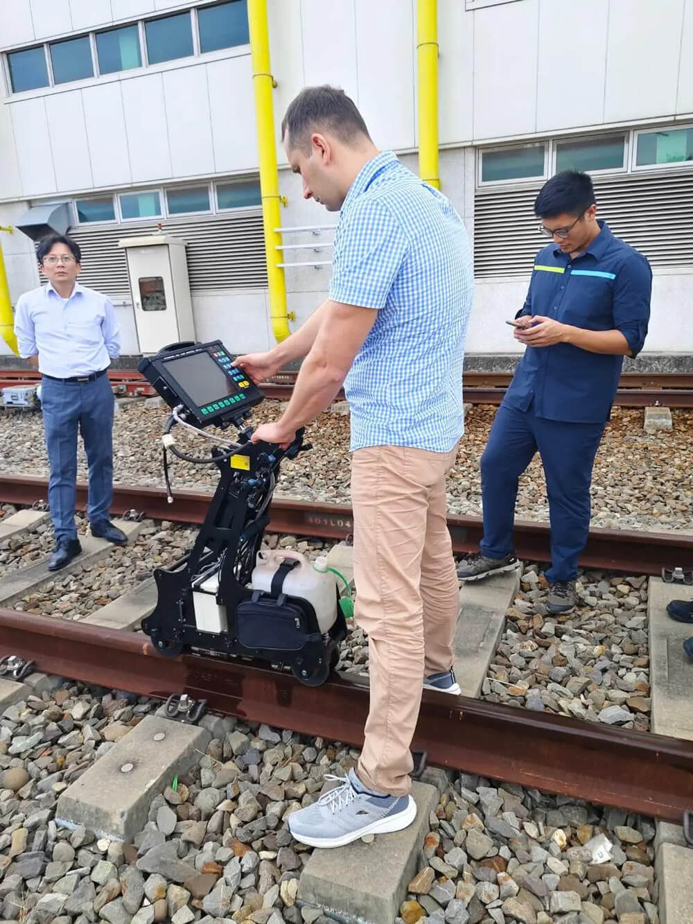 OKOndt GROUP specialist performing on-site service of the UDS2-77 SL rail flaw detector in Taiwan, 2025