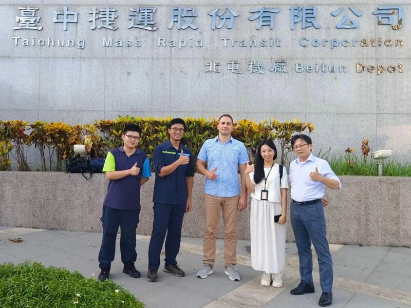 OKOndt GROUP specialist with NDT specialists from Taichung MRT at the entrance of Taichung Mass Rapid Transit Corporation