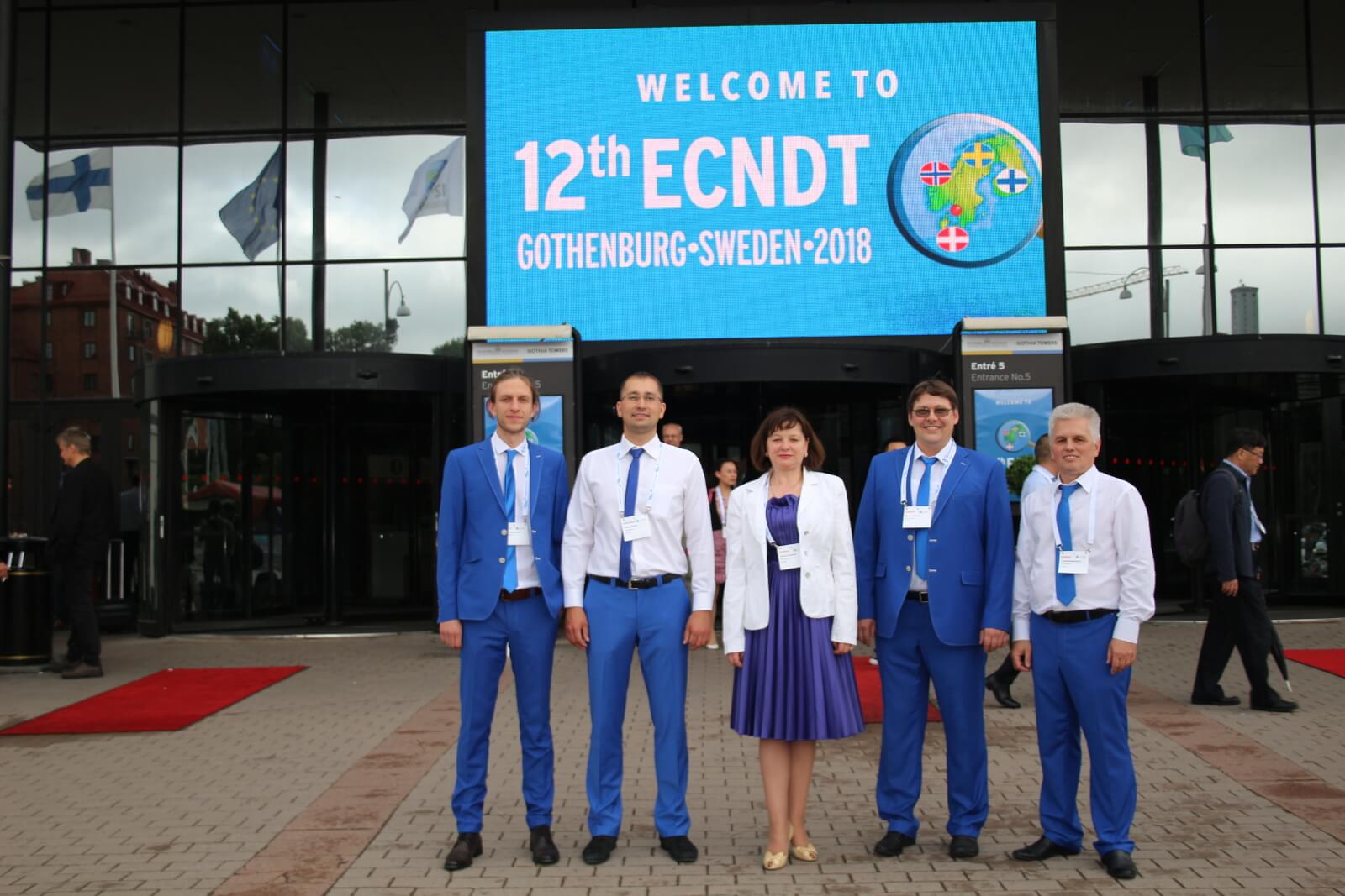 Delegates of OKOndt Group at the entrance of the exhibition center of the ECNDT-18, Sweden, Gothenburg

