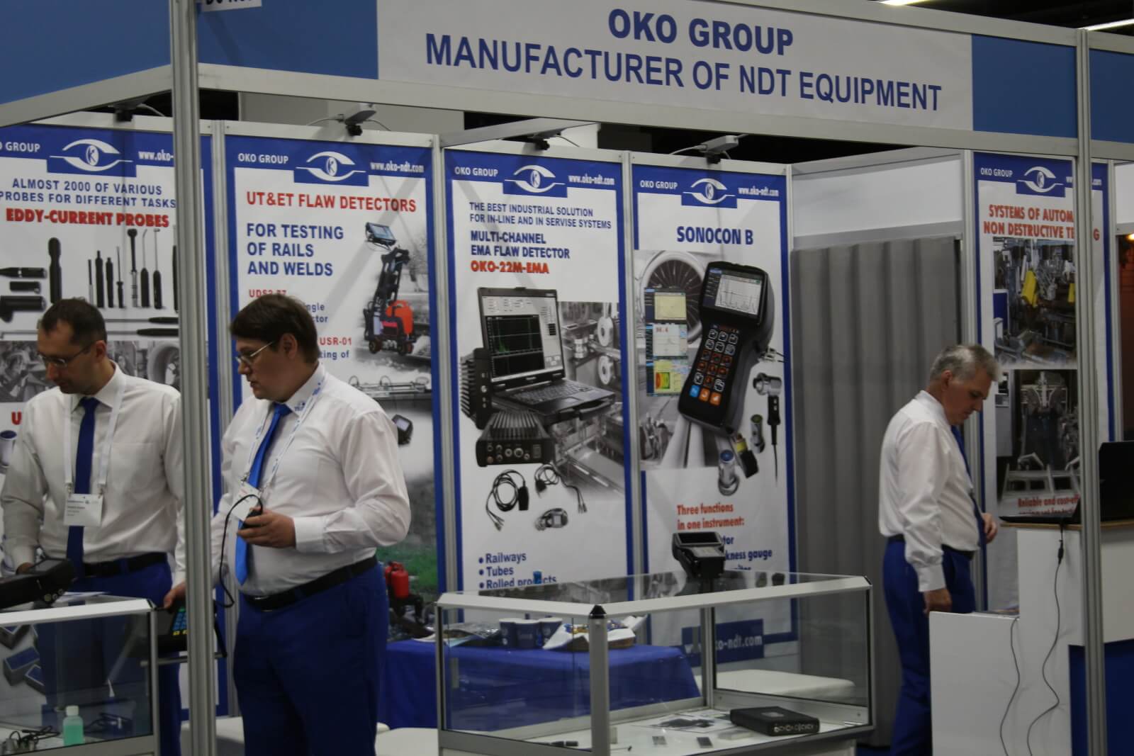OKOndt Group's specialists prepare the booth for the beginning of the 12th European conference of NDT, Gothenburg, Sweden, June 2018