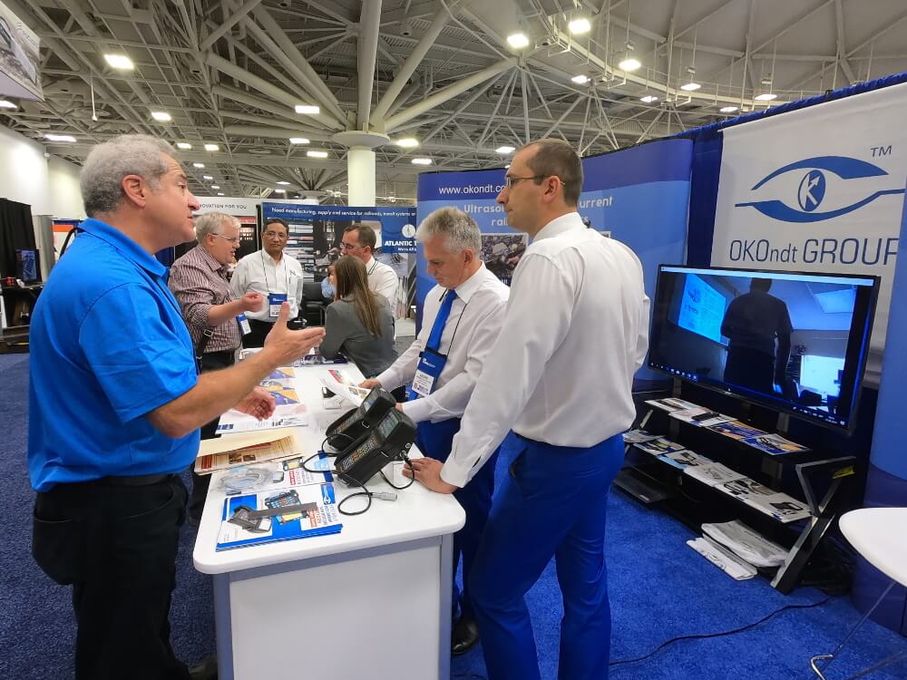 OKOndt Group's specialists work with the potential customers at the company's booth during the Railway Interchange 2019, Minneapolis, USA